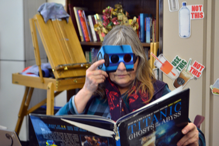 Judy checking out a 3-D book